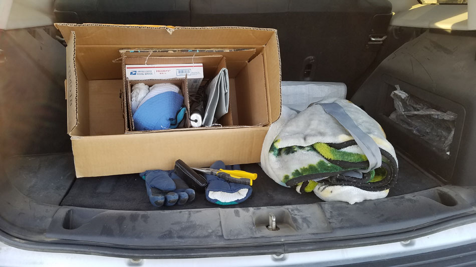 My bird and wildlife rescue gear. Boxes of many sizes, blankets, towels, wire cutters, knife, gloves, ties, and more. 