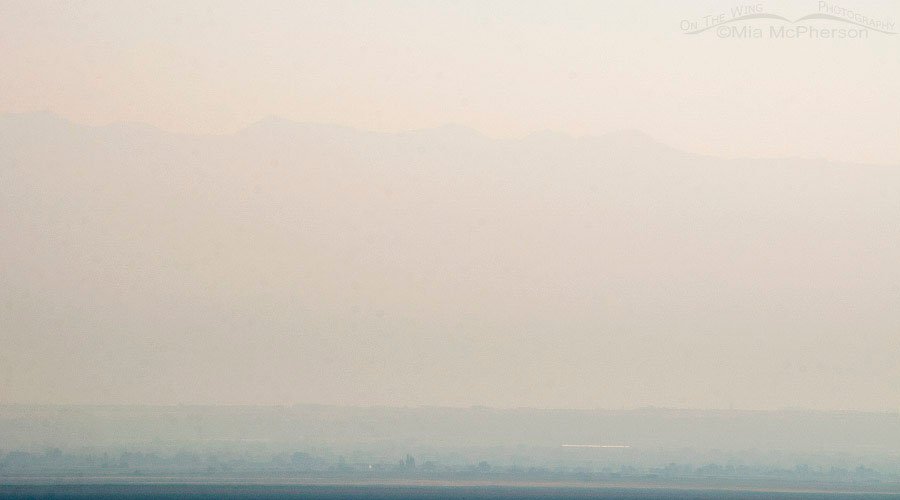 Smokey sky looking towards the Wasatch Range from Antelope Island, August 21, 2016, Antelope Island State Park, Davis County, Utah